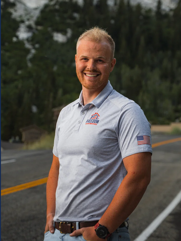 Freedom Garage Doors owner Joseph in uniform, ready to service your garage door across the Salt Lake Valley